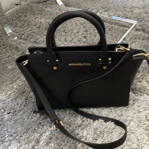 Gently used Michael Kors Saffiano leather handbag.